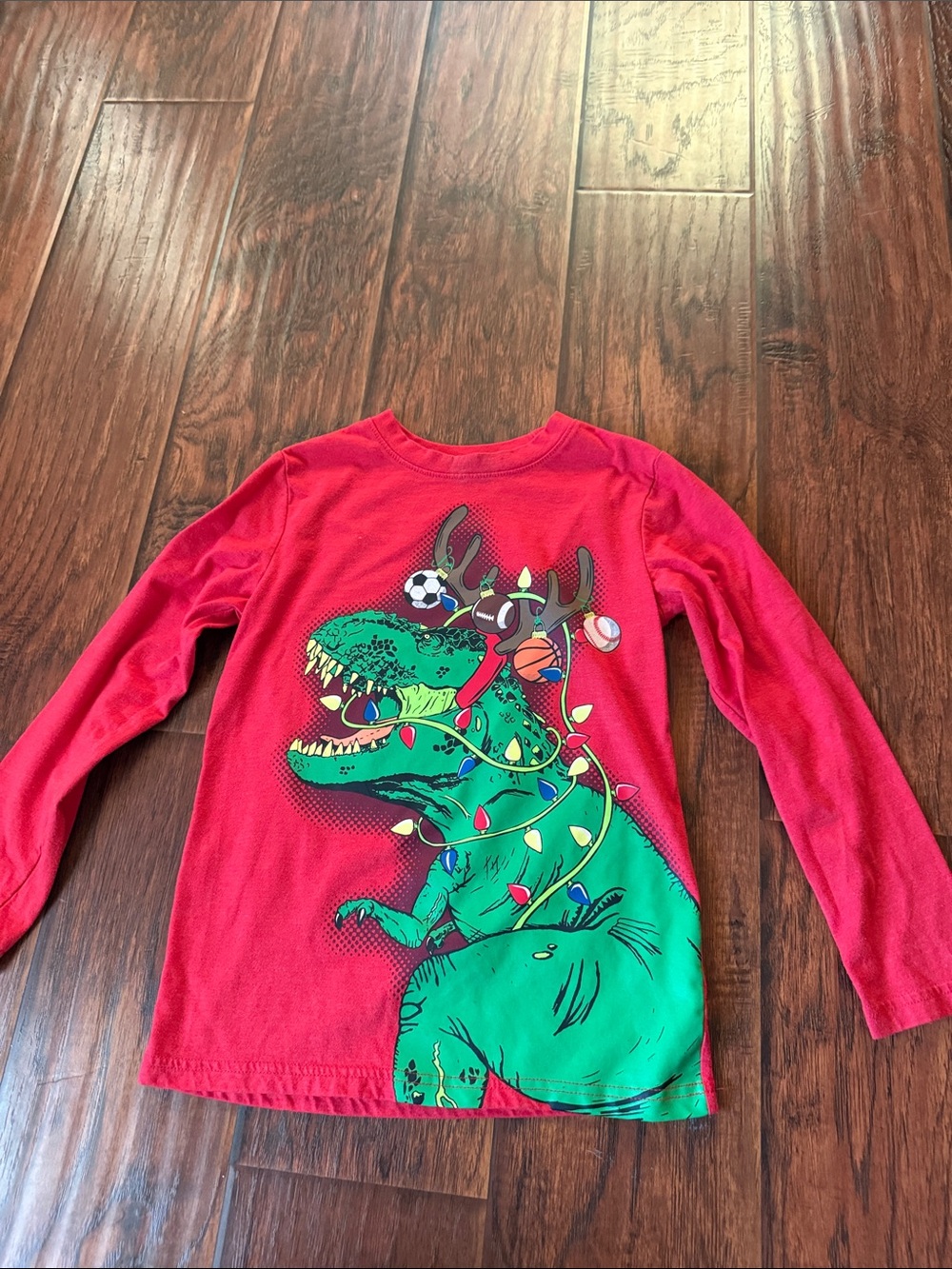 6/7 Cat & Jack Christmas Dinosaur long sleeved t shirt. Worn once